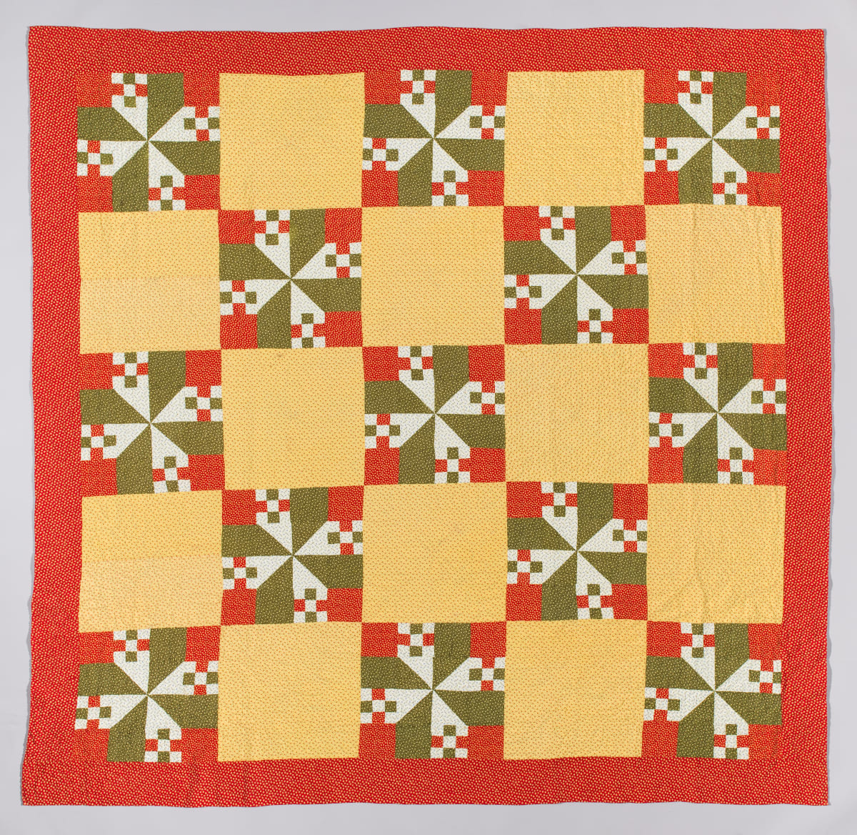 Pinwheel and Nine Patch Quilt by Unknown Artist 