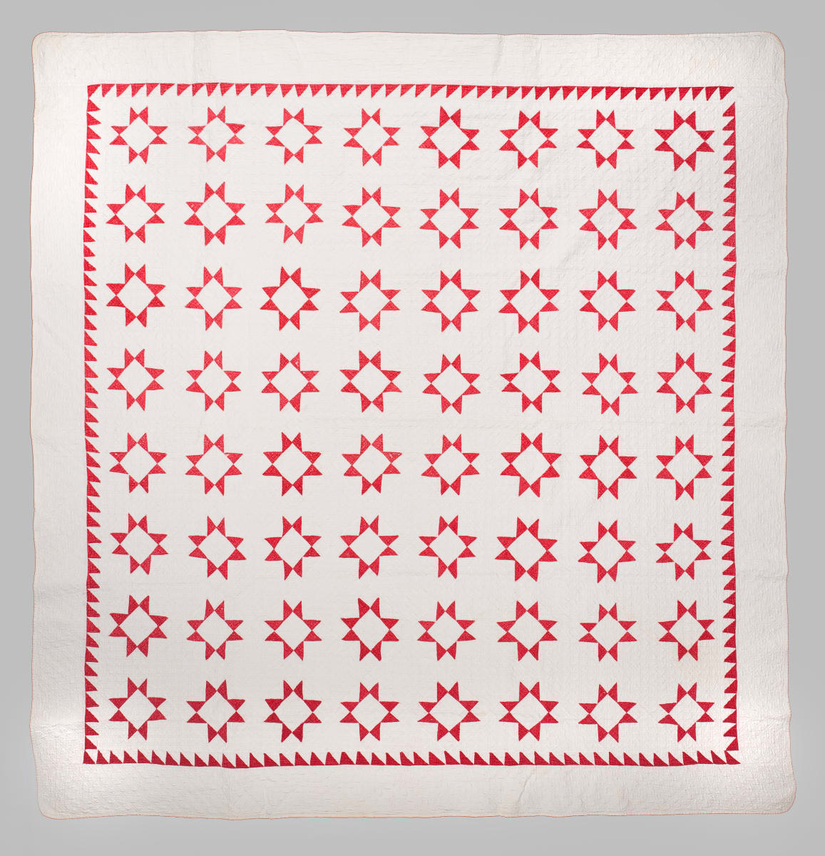 Red and White Star Quilt by Unknown Artist 