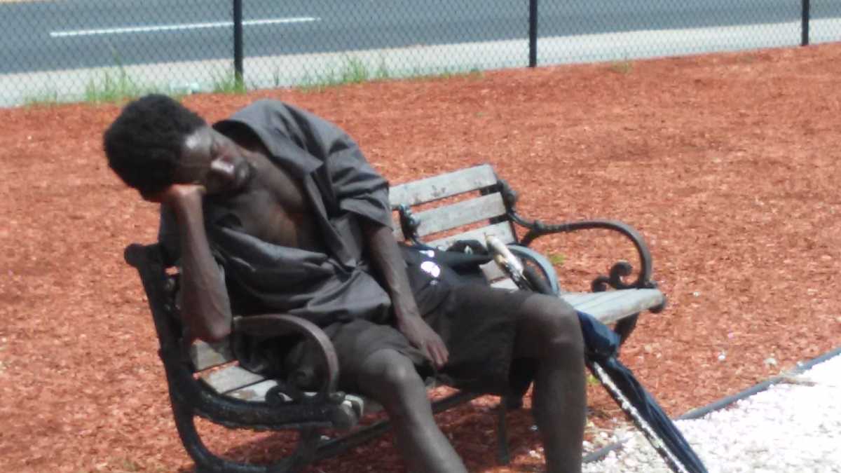 Man On A Bench by Yocontalie Jackson, Image 1.