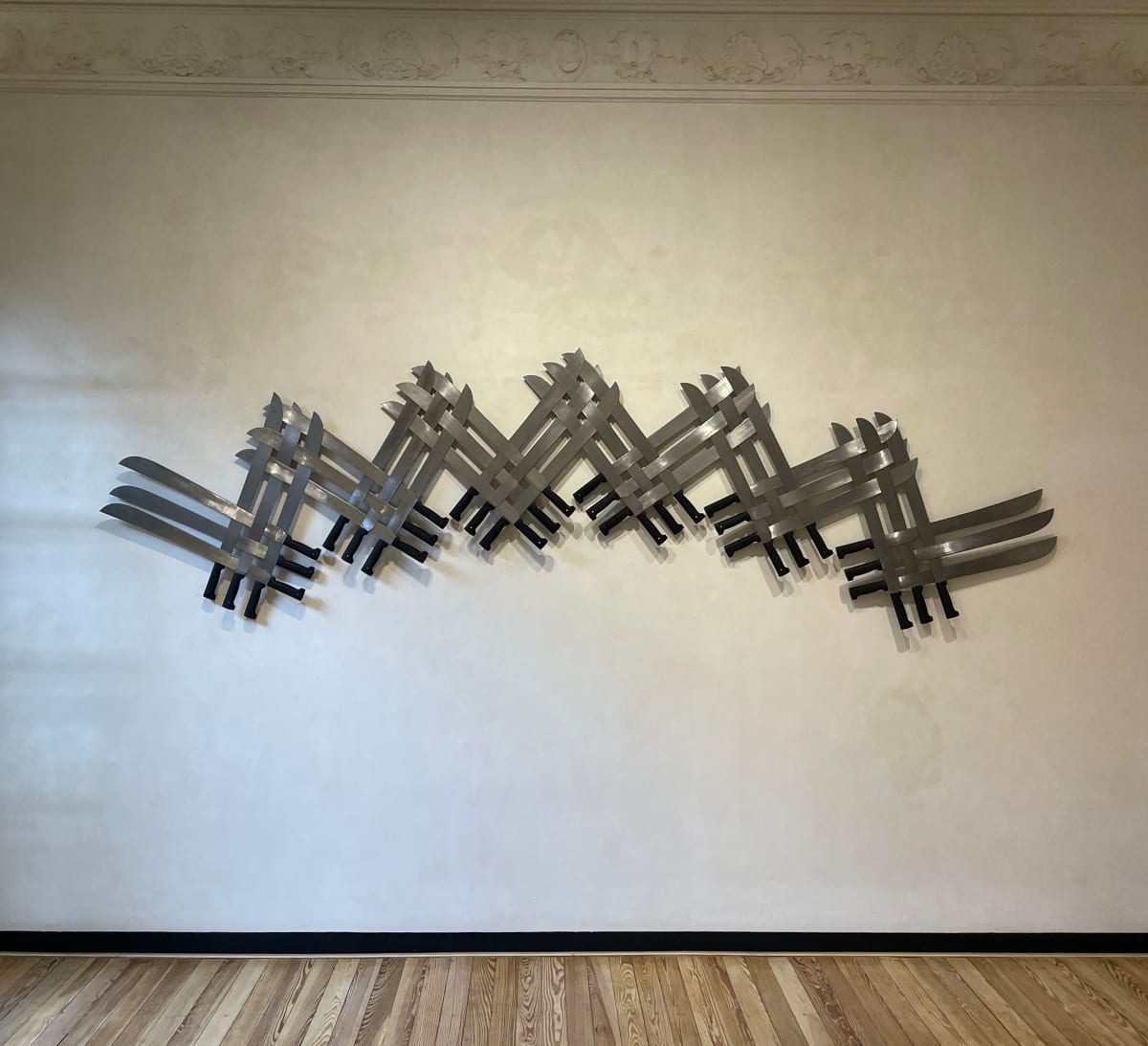 El deseo de serenidad frente al implacable rumbo natural de la condición humana (Blasón 16) by Miguel Rodriguez Sepulveda  Image: Exposición "Sueñan los machetes" en GAT Galería Ana Tejeda