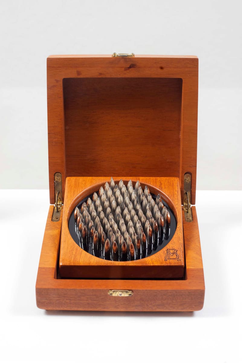 1 Kg De Balas De Plata Libertad by Miguel Rodriguez Sepulveda  Image: Montaje en exposición FUGA Y ENTROPÍA en MARCO Museo de Arte Contemporáneo de Monterrey