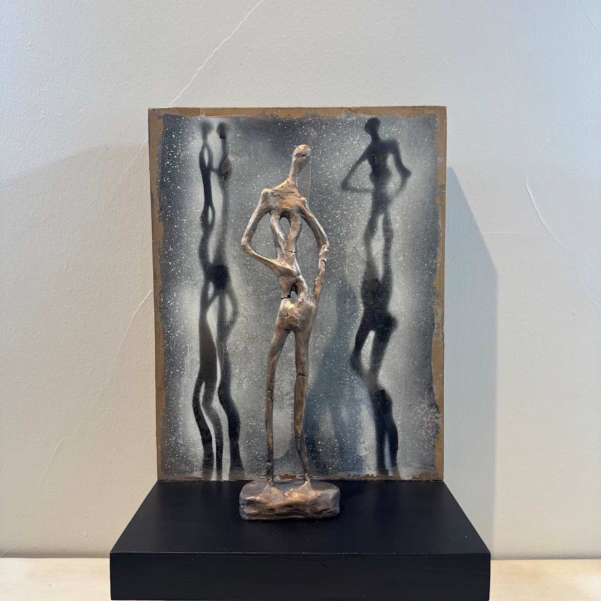 Shadows and Grace, No. 1, bronze on wood base by Kim DiDonato 