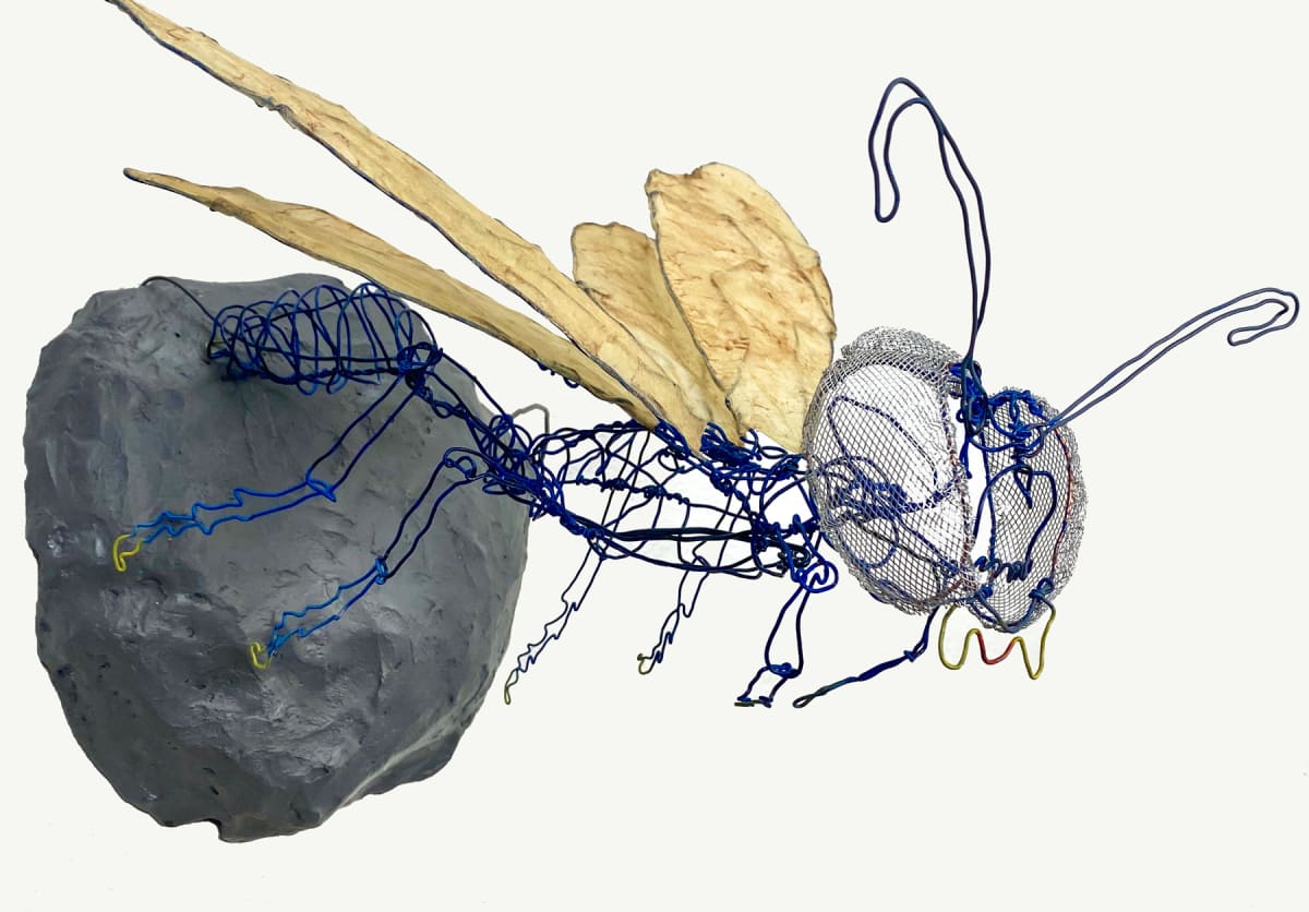 Muddauber Wasp by Judy Vienneau  Image: Side view of 3-d sculpture that mounts on the wall