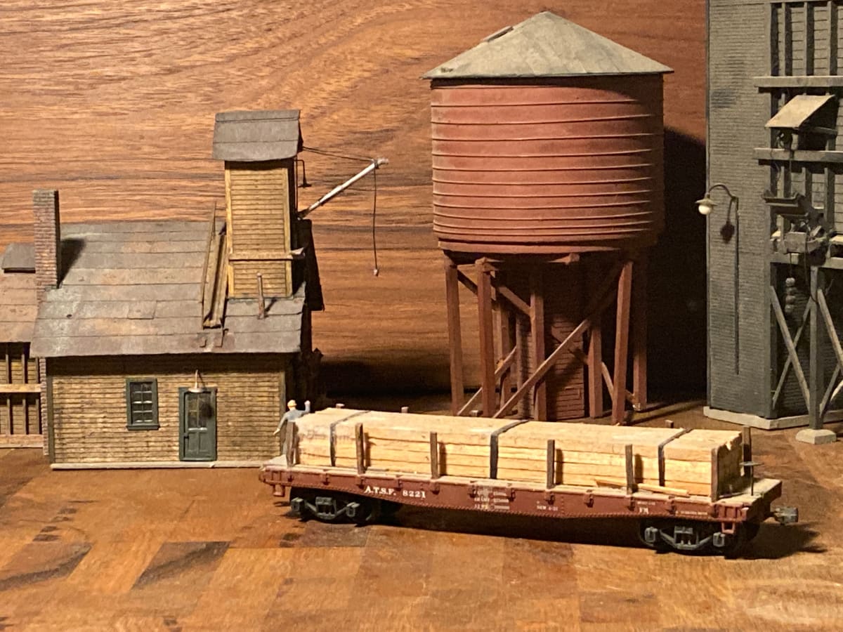 A. T. & S. F. flatbed with lumber model toy train 