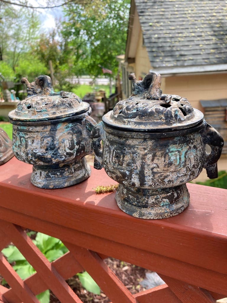 Pair of metal incense pots 