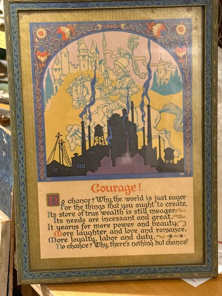 Framed motto "Courage" 