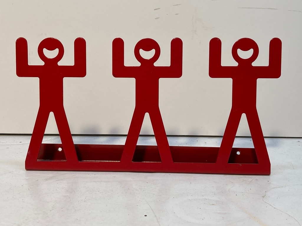 post modern red figural wall shelf 