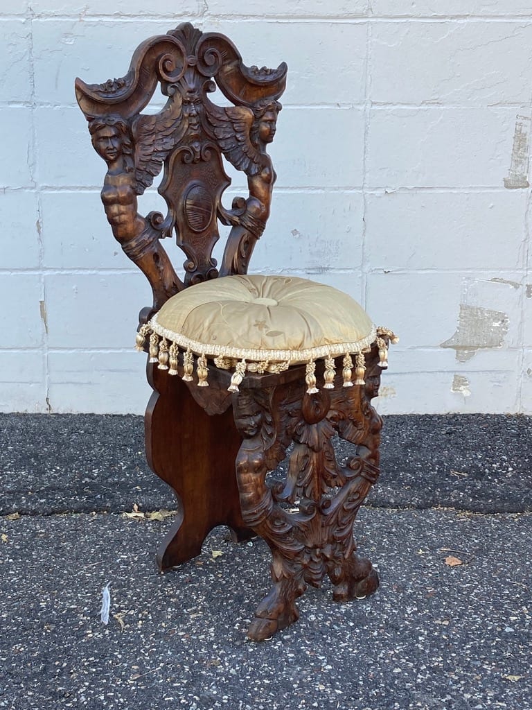 Hand carved walnut chair from the collection of TIMELINES ANTIQUES Artwork Archive