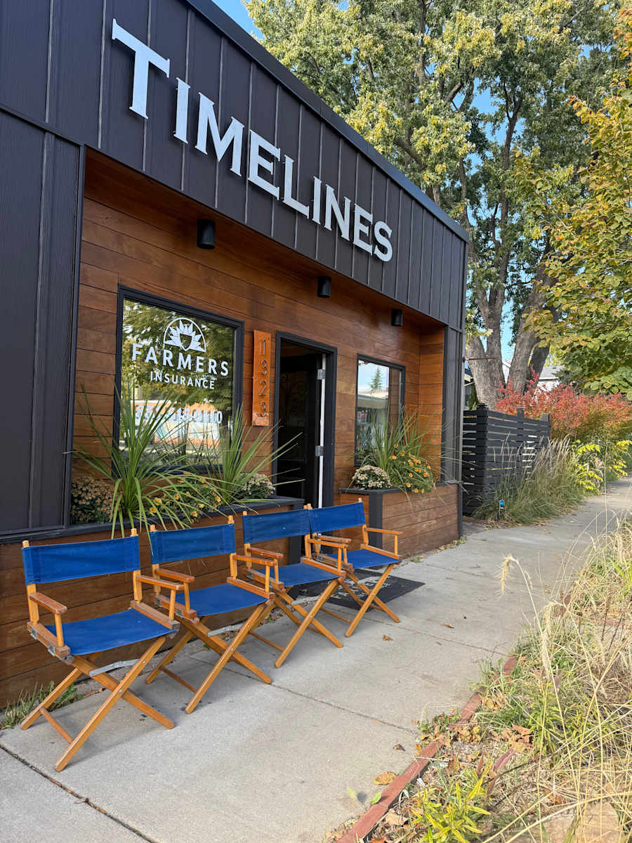 pair of blue directors chairs 