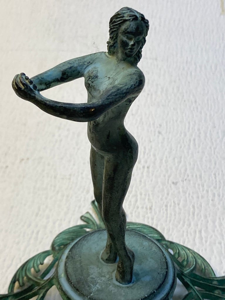 Art Deco bud vase holding metal figure 