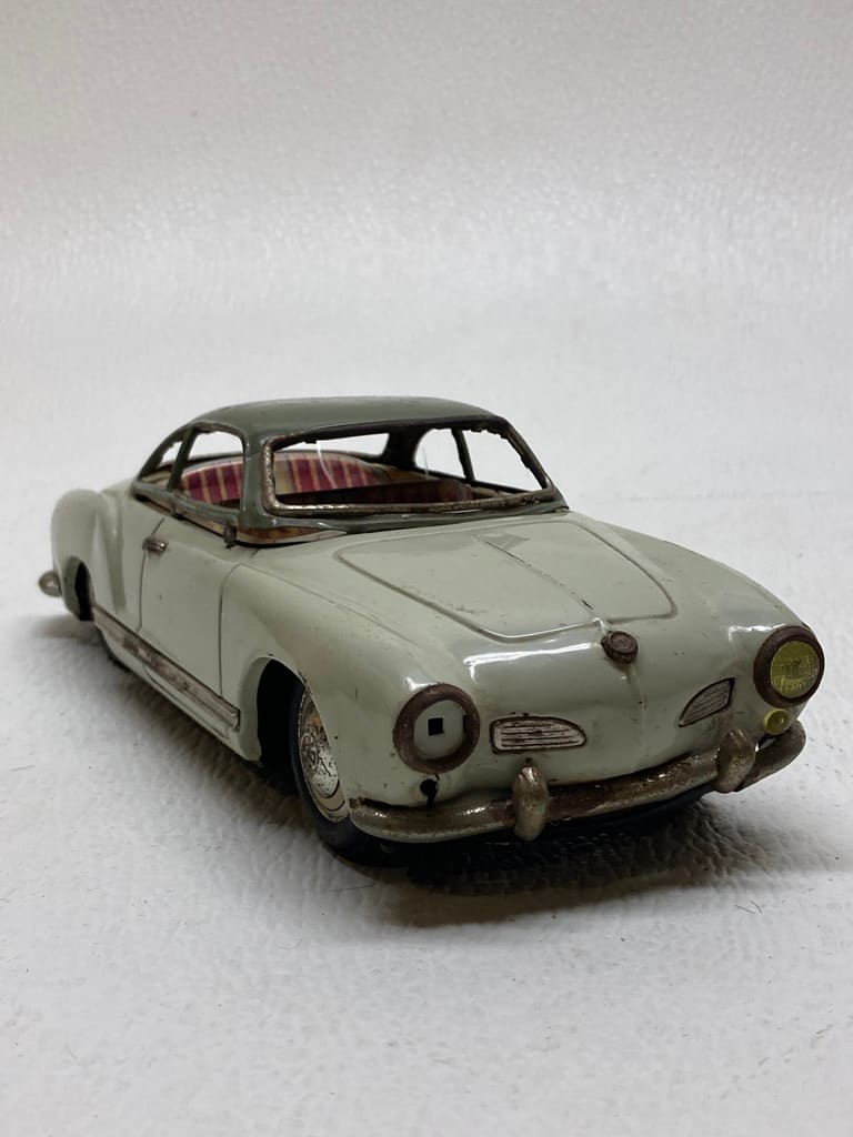 vintage toy tin Karmangia car 