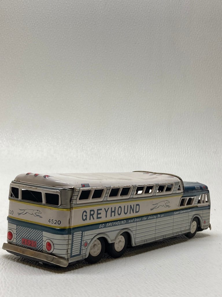 Vintage tin toy greyhound bus 