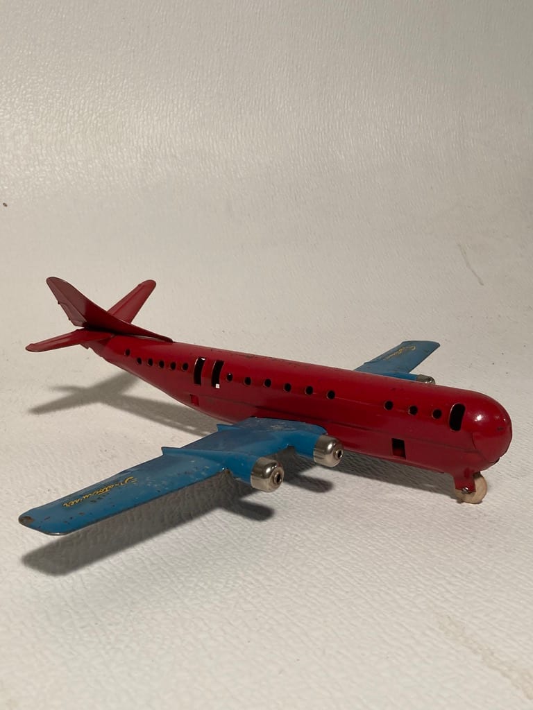 Red and blue Stratocruiser  toy airplane 