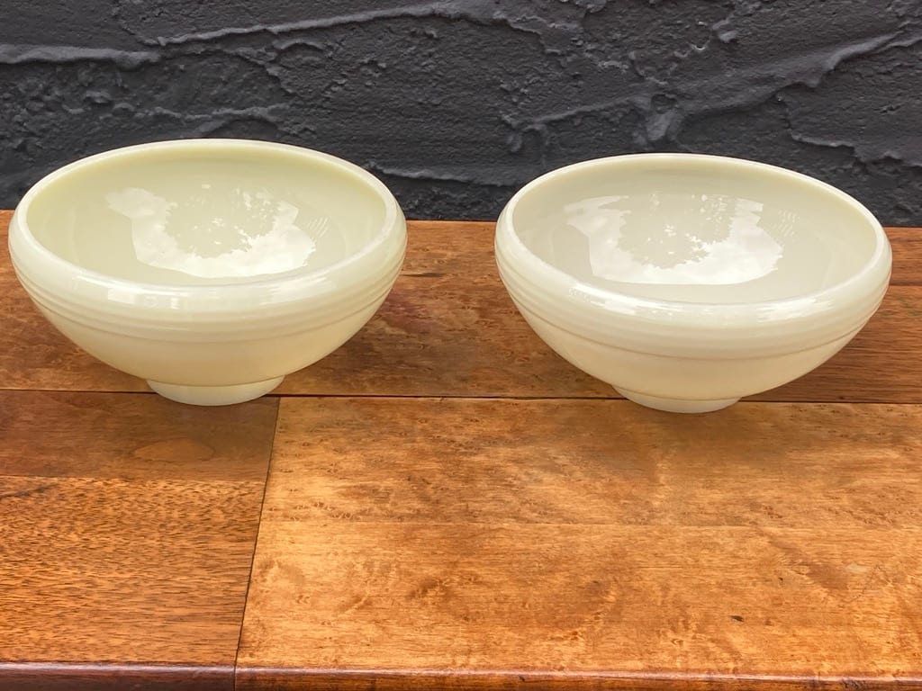 pair of custard glass globes 