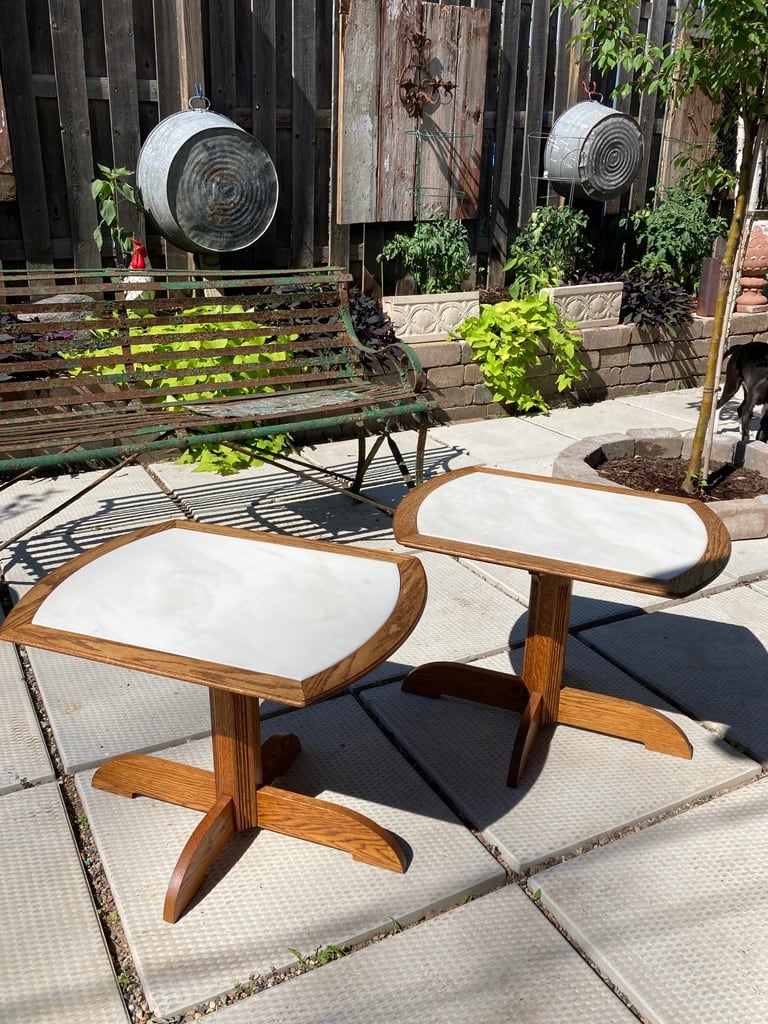 pair of oak and white faux stone top tables 