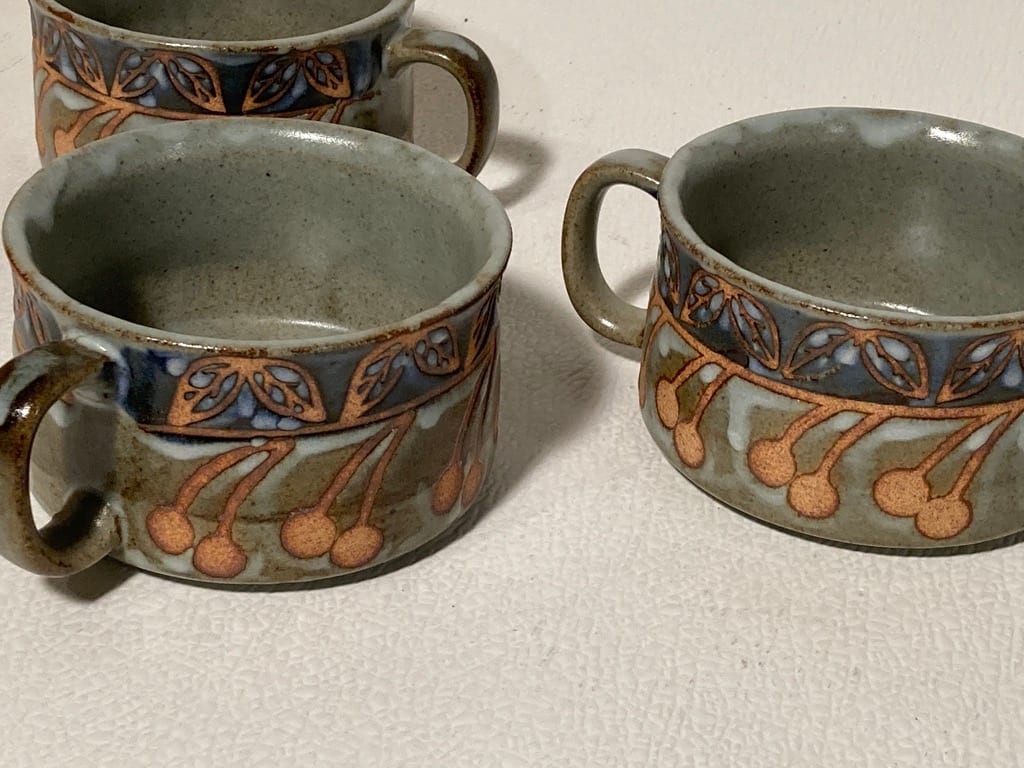 4 hand made pottery mugs 