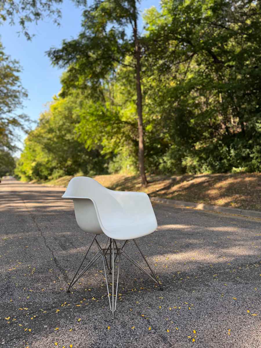 White Herman Miller shell arm chair 