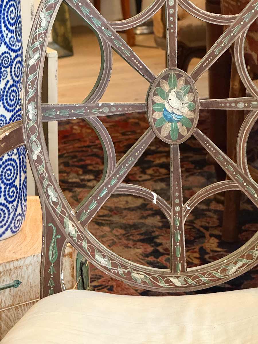 Painted chair with spider web design 