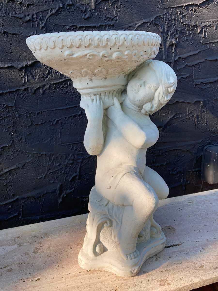 Garden cement cherub with vase on shoulder 