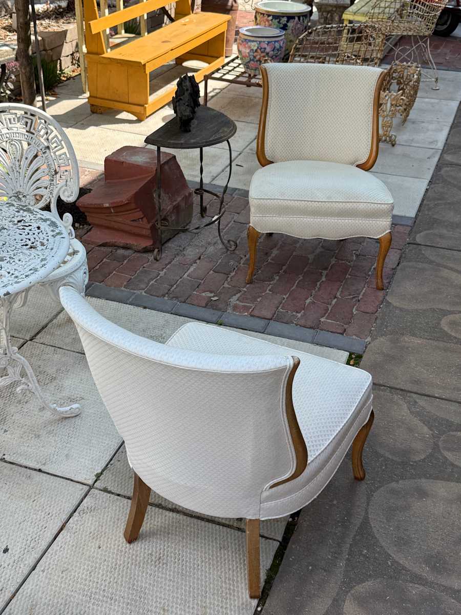 Pair of decorative mid century modern upholstered chairs 