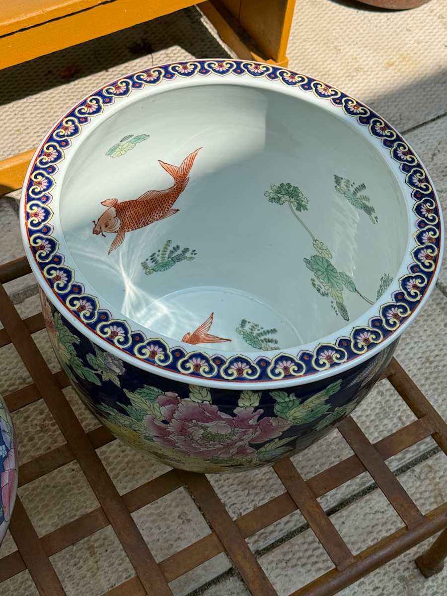 Chinese jardiniere with black with bright flowers 