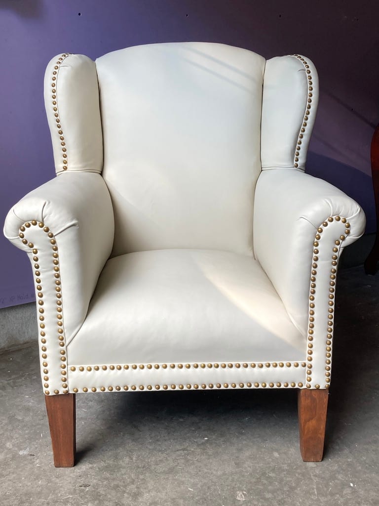 Upholstered Art Deco White leather wingback 