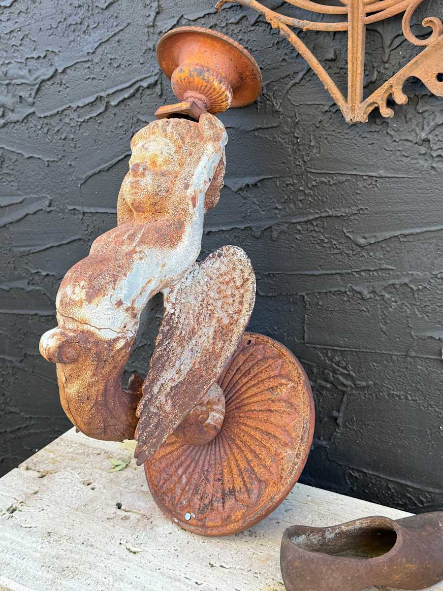 Cast iron garden wall mounted winged cherub 