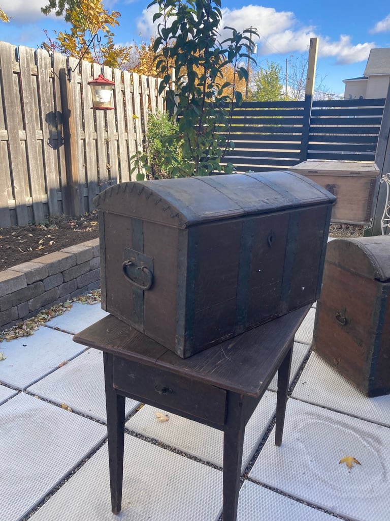 Domed carved and strapped pine trunk 