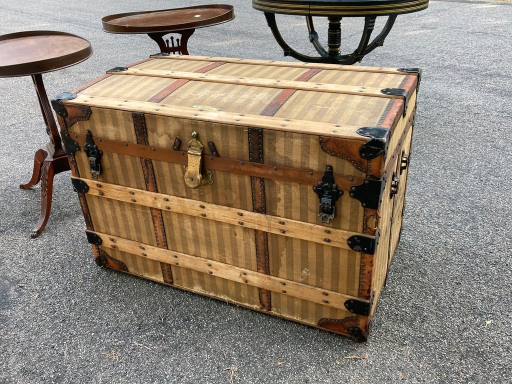 vintage trunk with ticking cloth face 