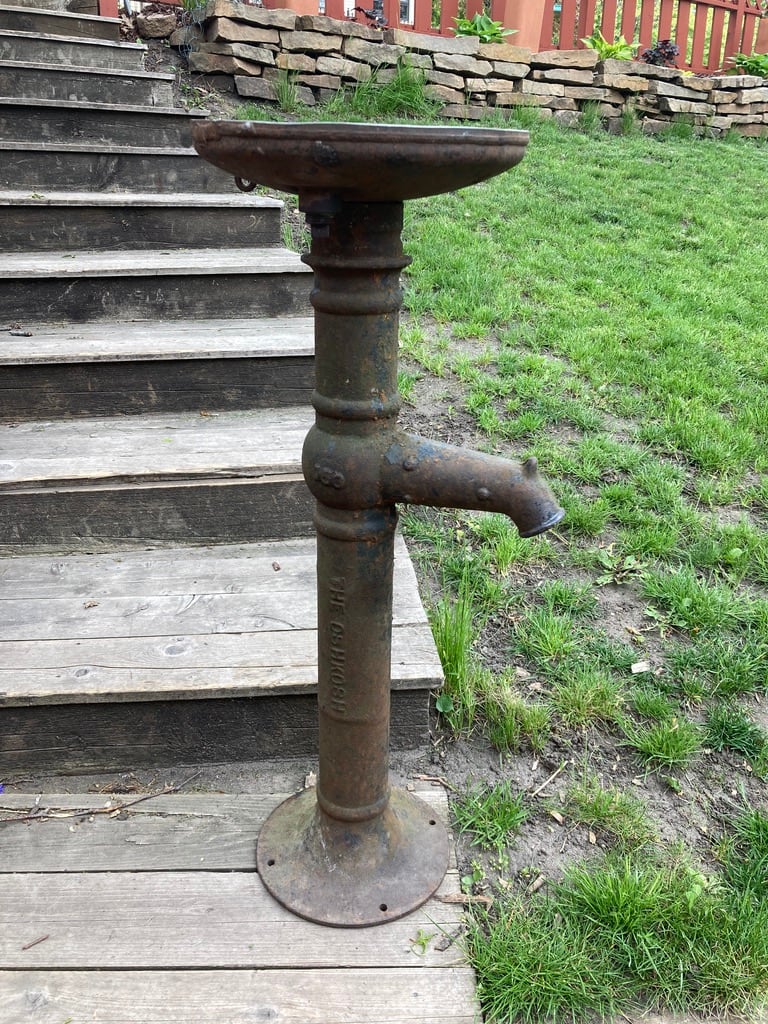 Iron water pump bird bath 