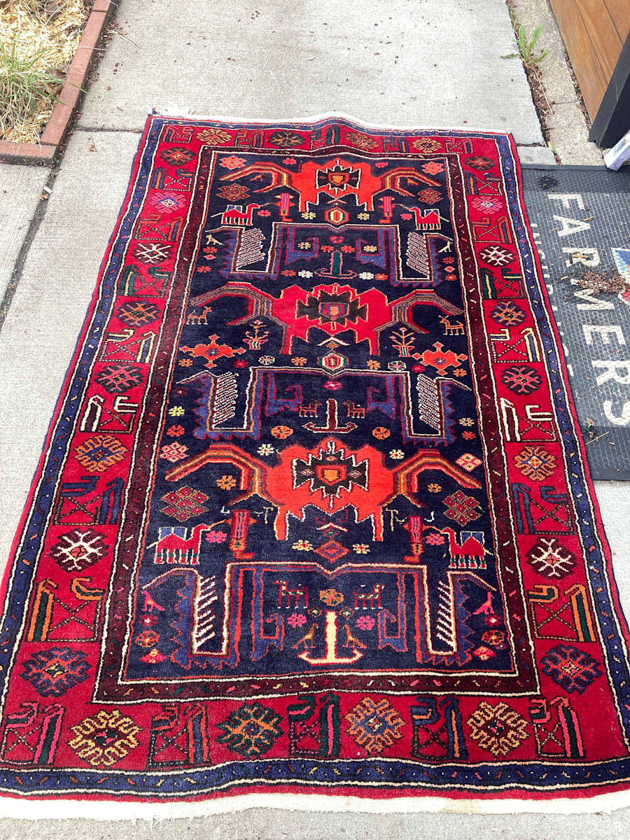 Vintage handmade wool rug with camels, Image 1.