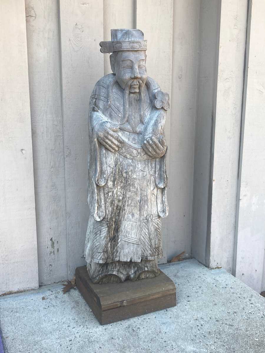Carved wooden Asian figure 