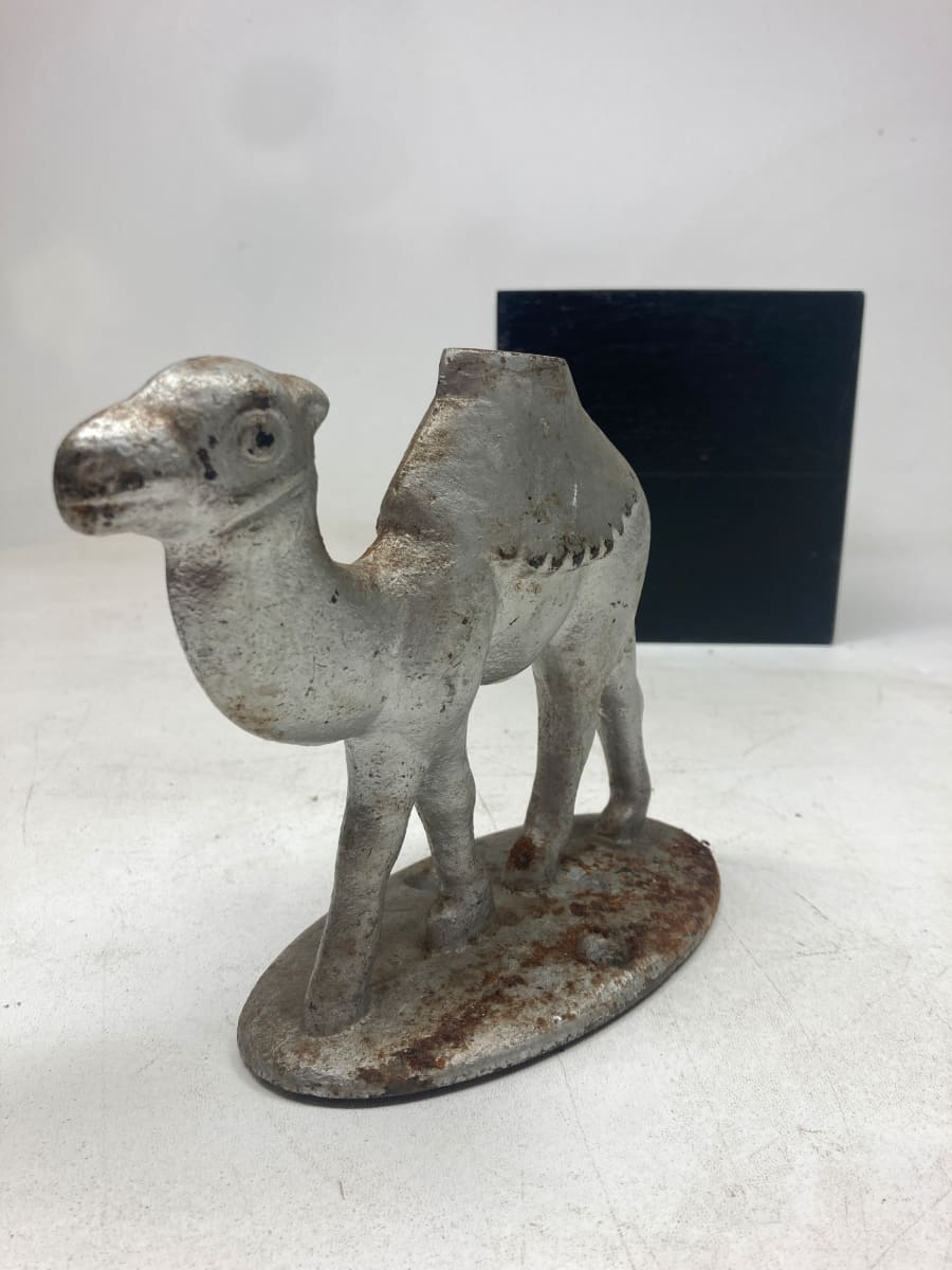 Cast iron camel door stop 