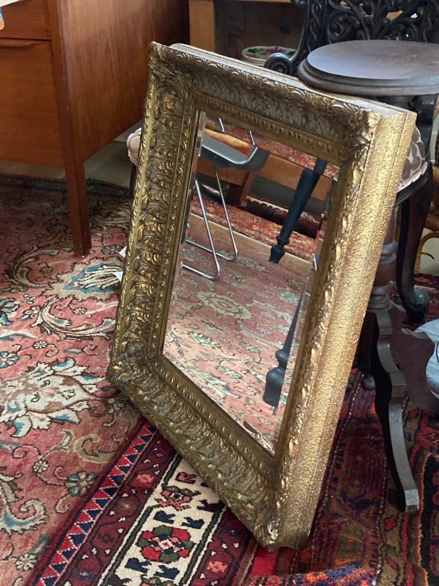 Ornate gold mirror 