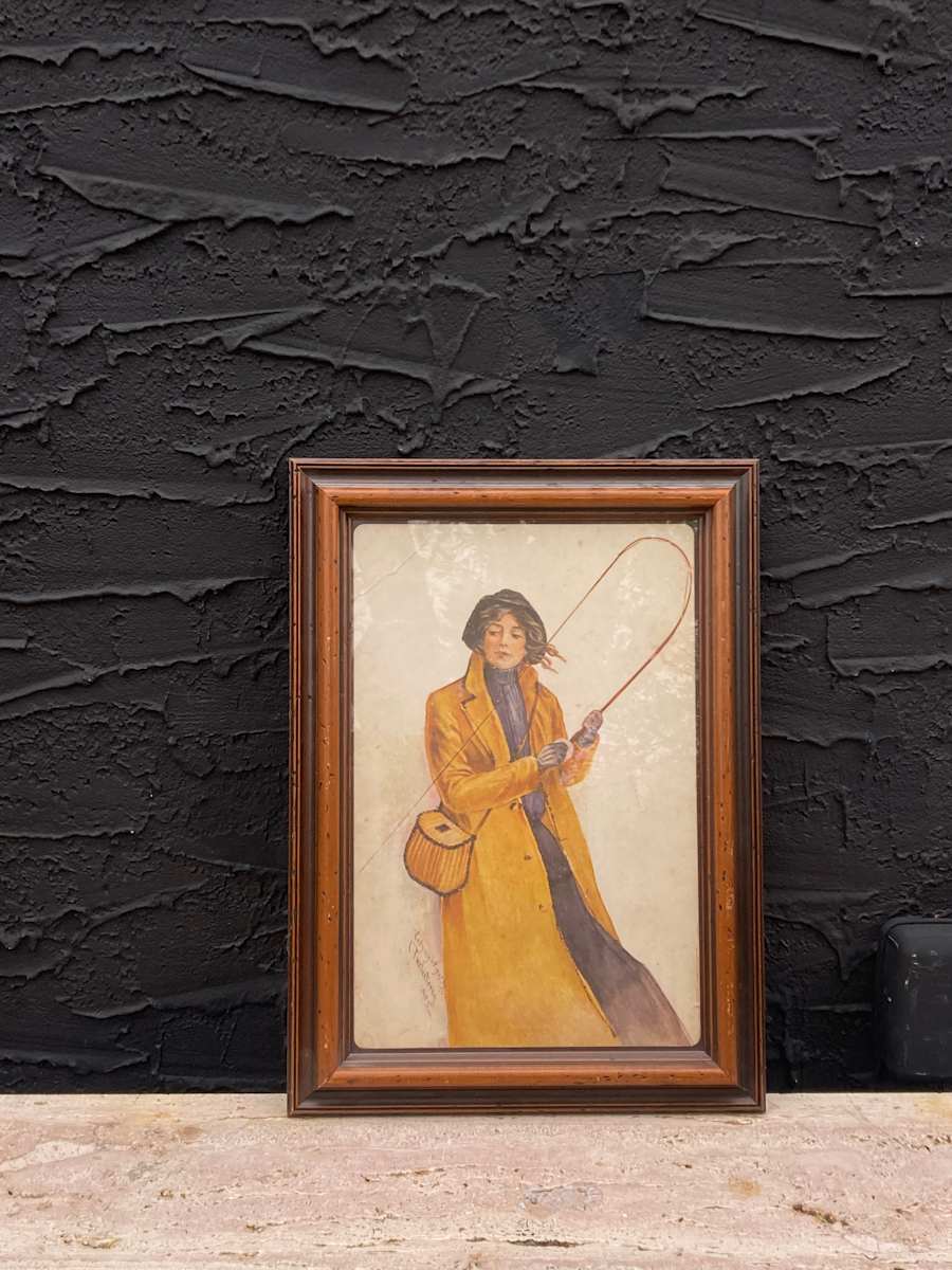 framed litho of fly fishing lady 
