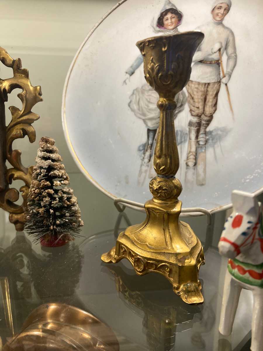 pair of small gold candle sticks 