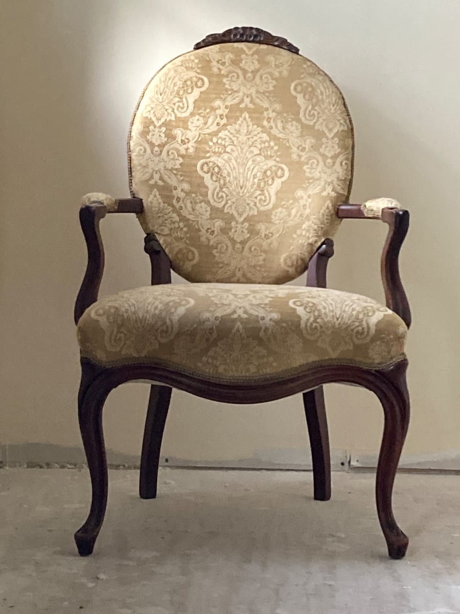 Pair of upholstered ornate medallion back chairs 