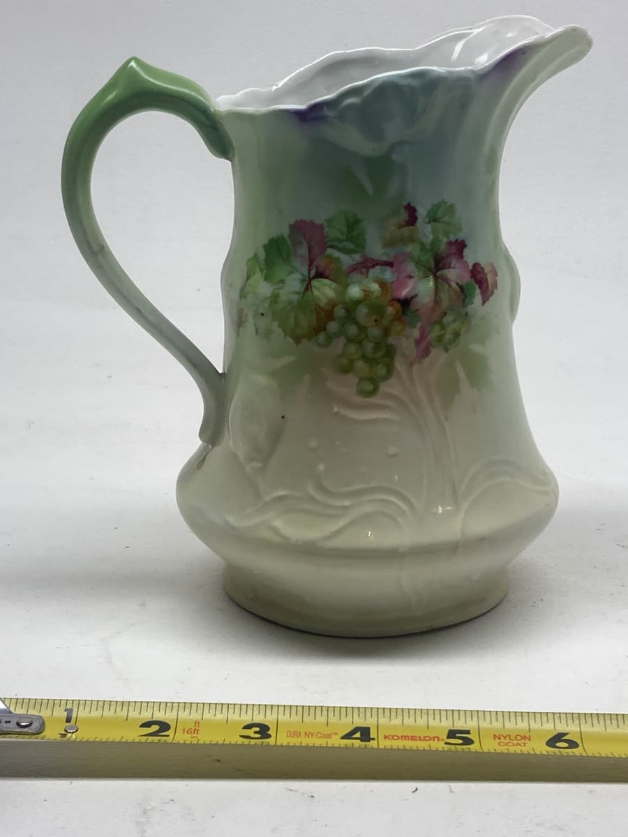 turn of the century porcelain pitcher 