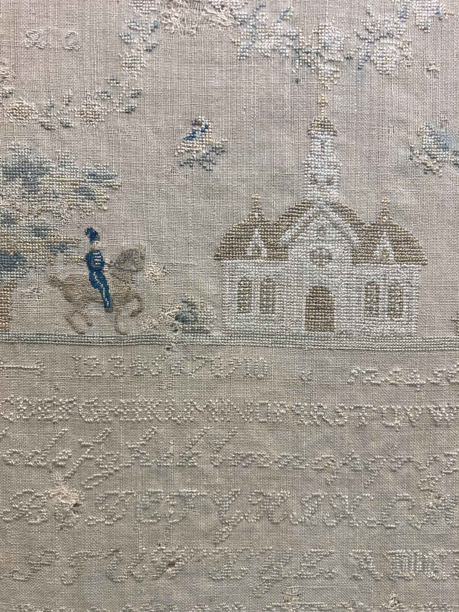 Framed sampler with horse 