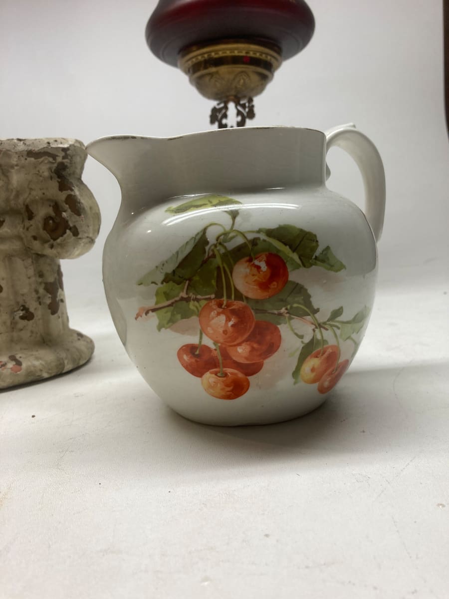 turn of the century water pitcher with cherries 