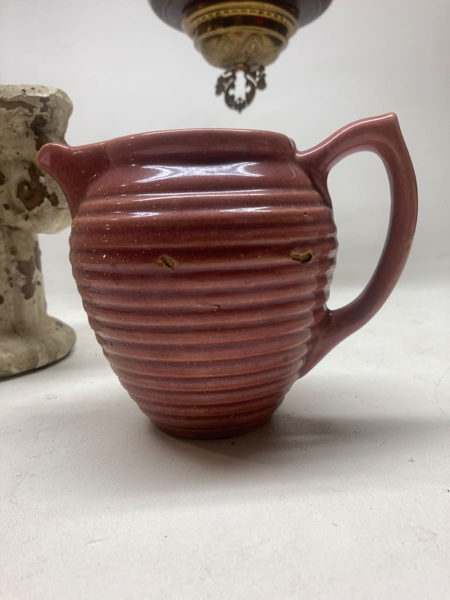 cranberry  pottery water pitcher 