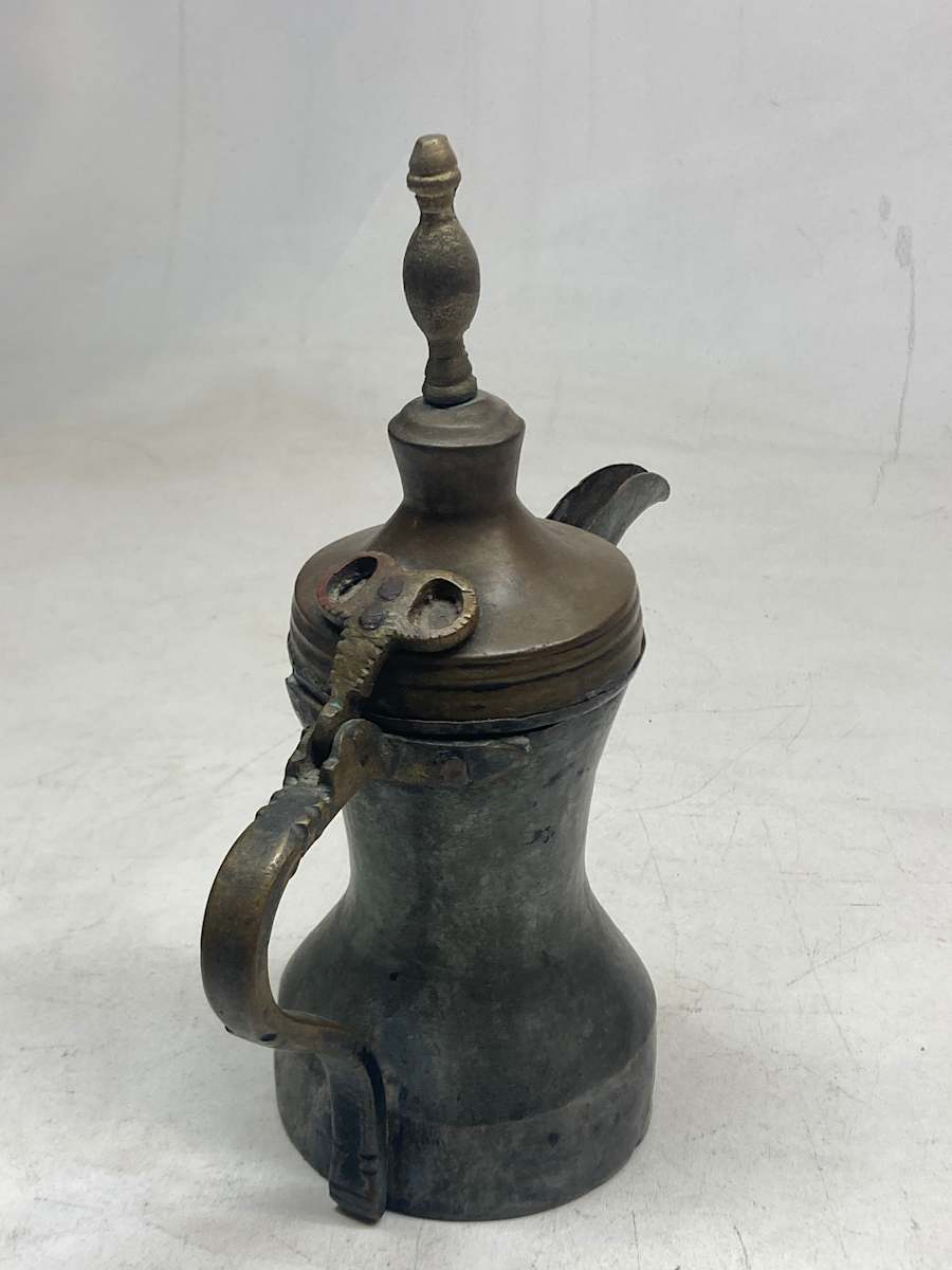 Vintage covered copper pitcher 