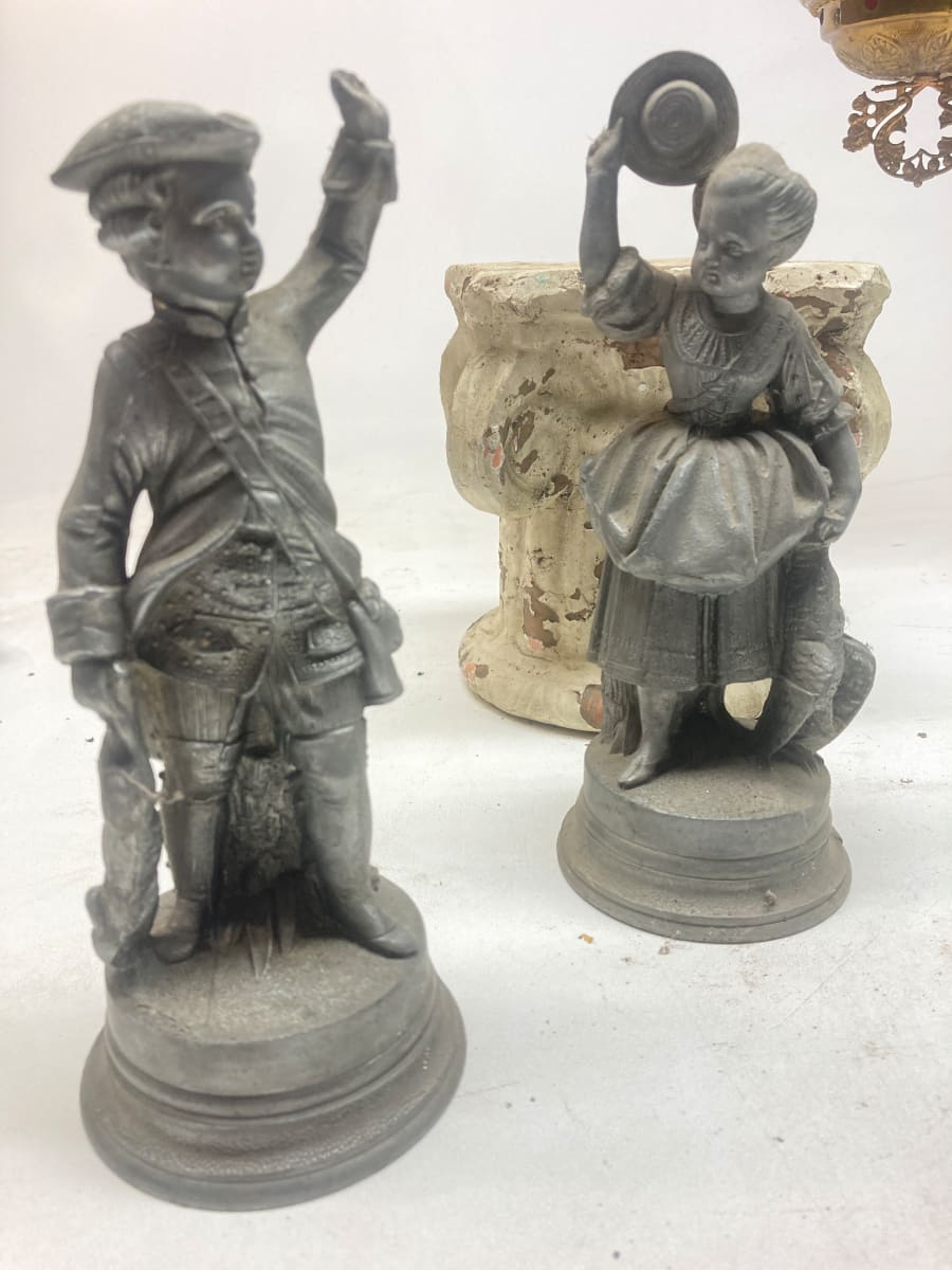 pair of turn of the century metal figures 