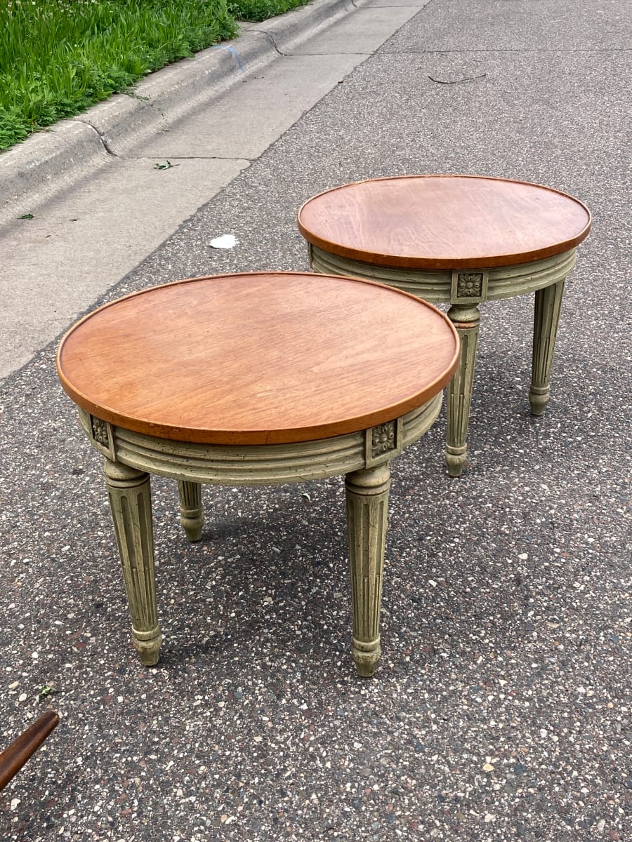 pair of round Heredon low tables 