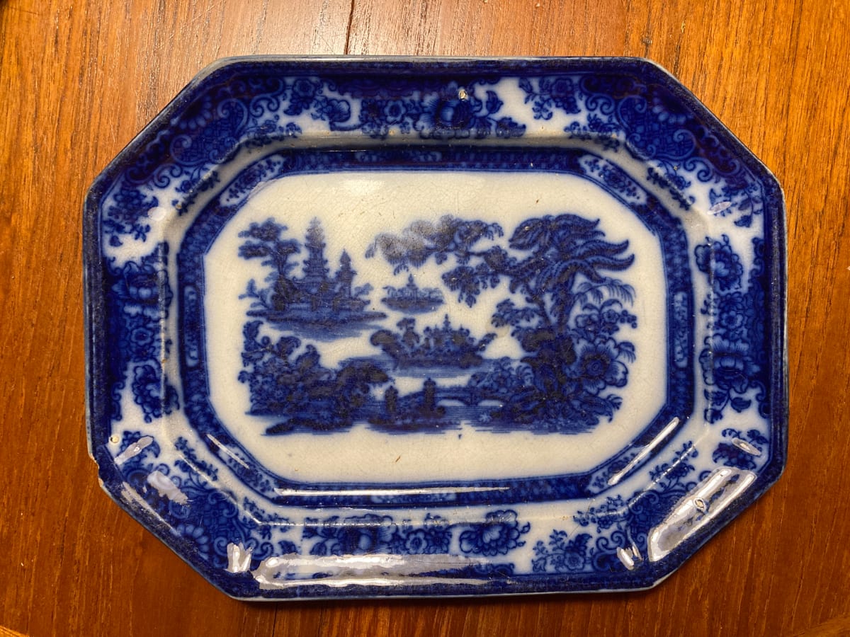 Turn of the century blue willow flow blue plate 