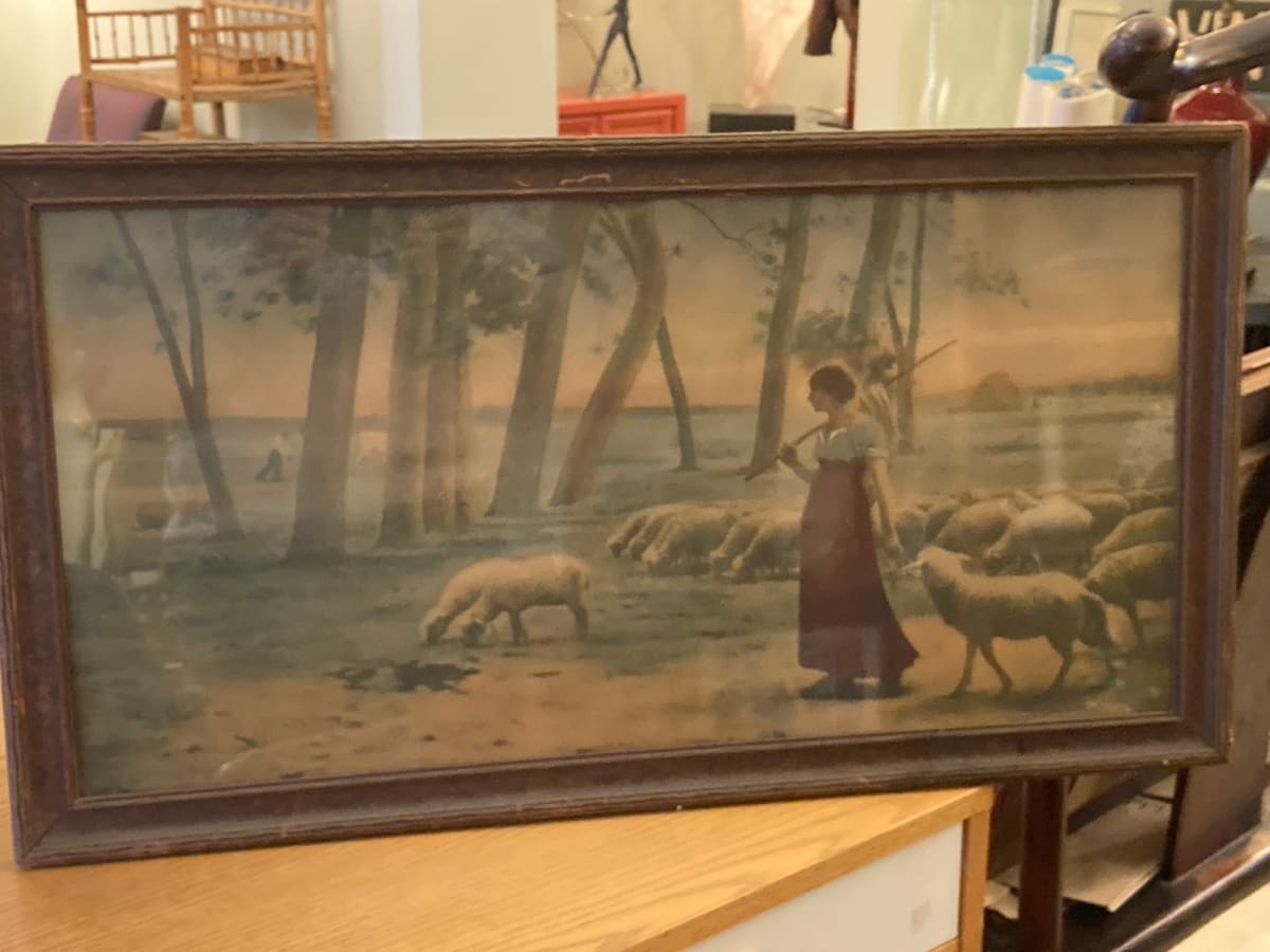 Framed lithograph of sheep herder girl 