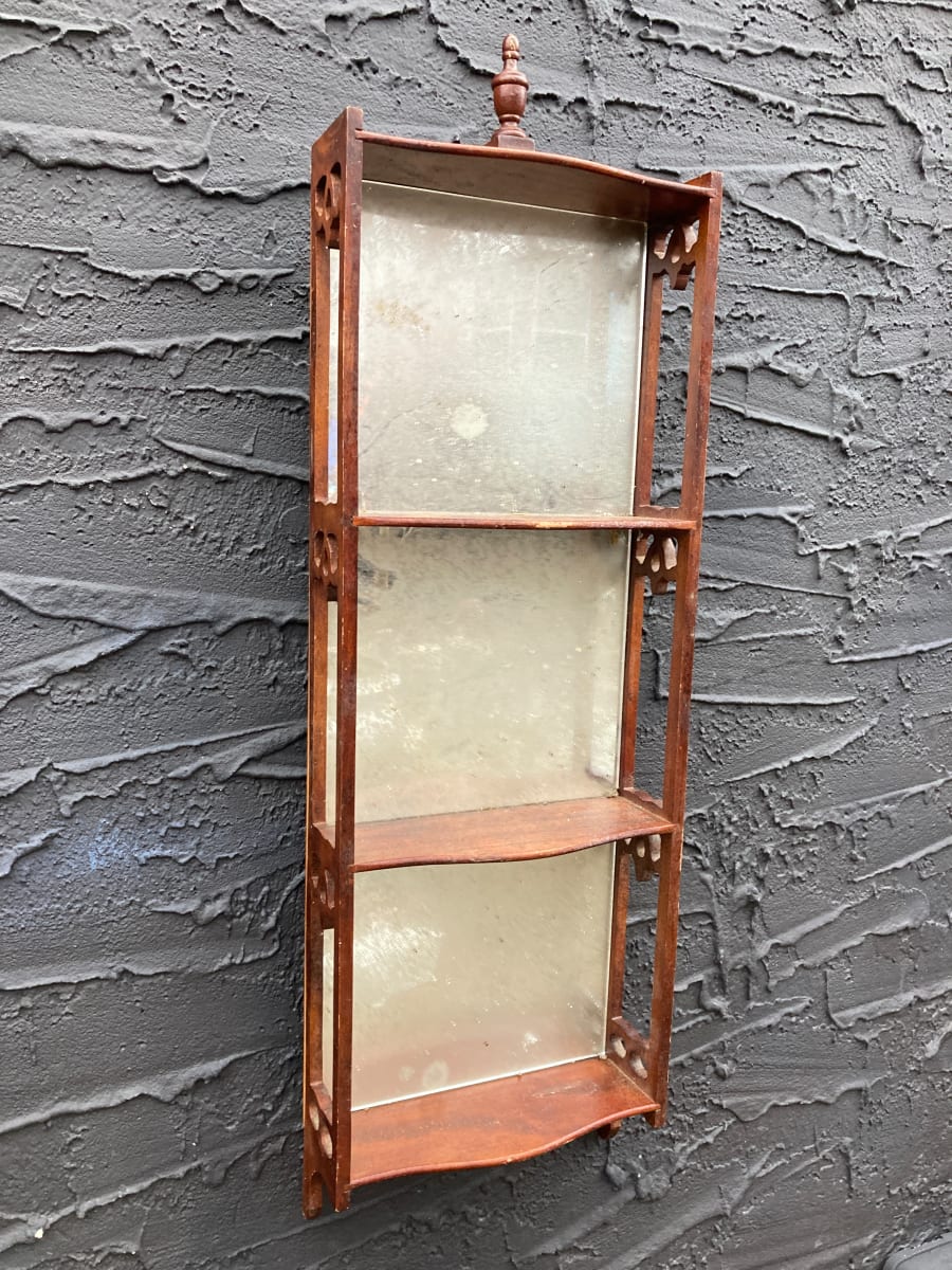 Narrow  walnut carved wall shelf 