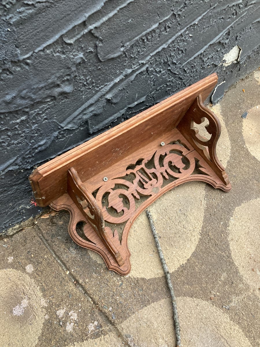 Turn of the century walnut carved wall shelf 