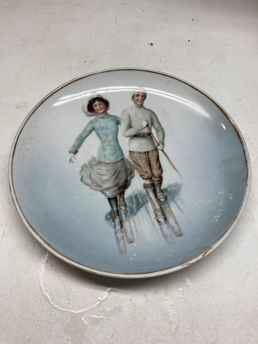 Pair of hand decorated turn of the century winter plates 