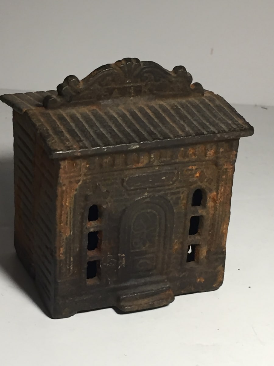 vintage cast iron penny bank 